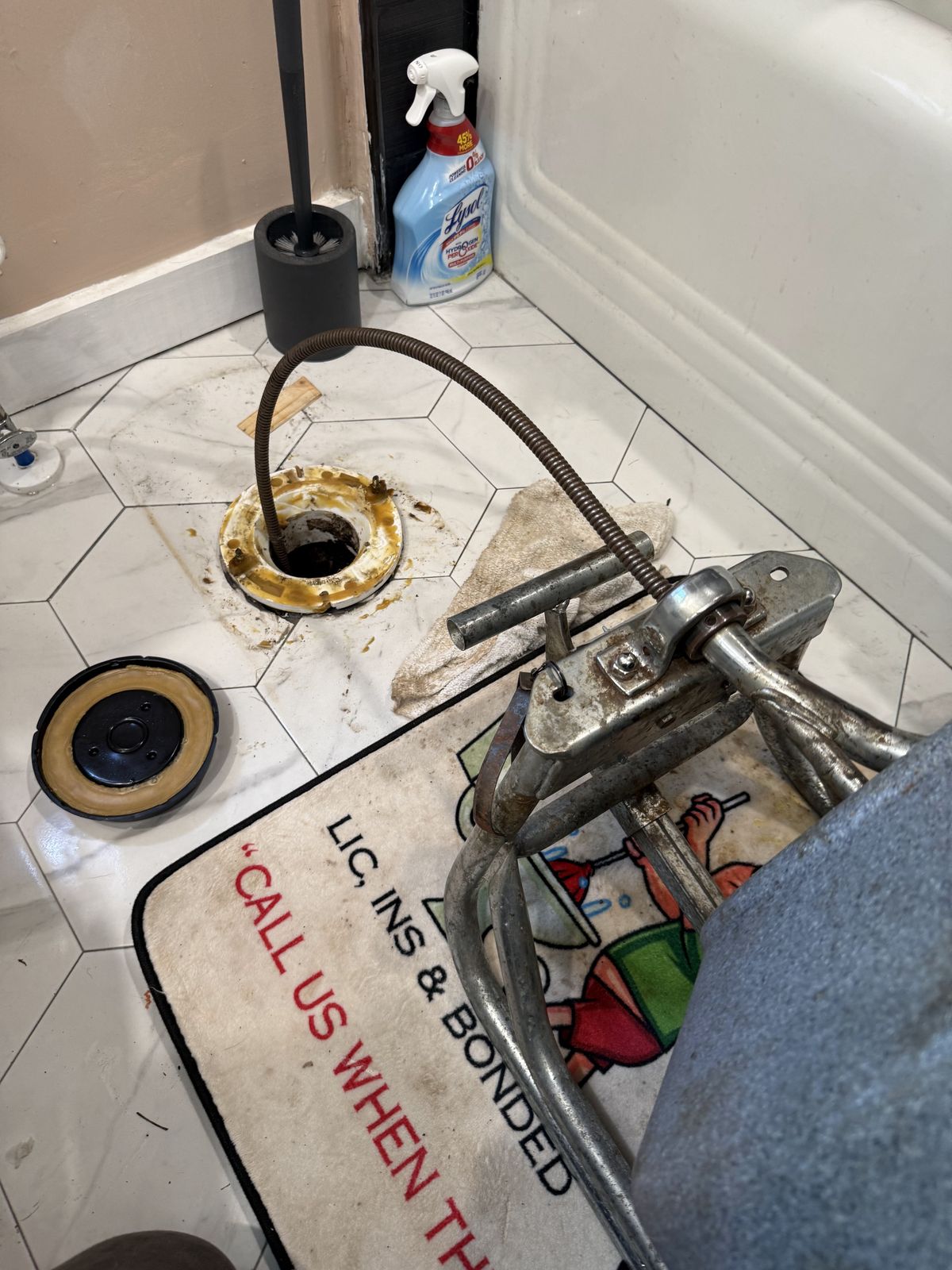 Toilet pulled and G&R running an auger through the flange during a real service call